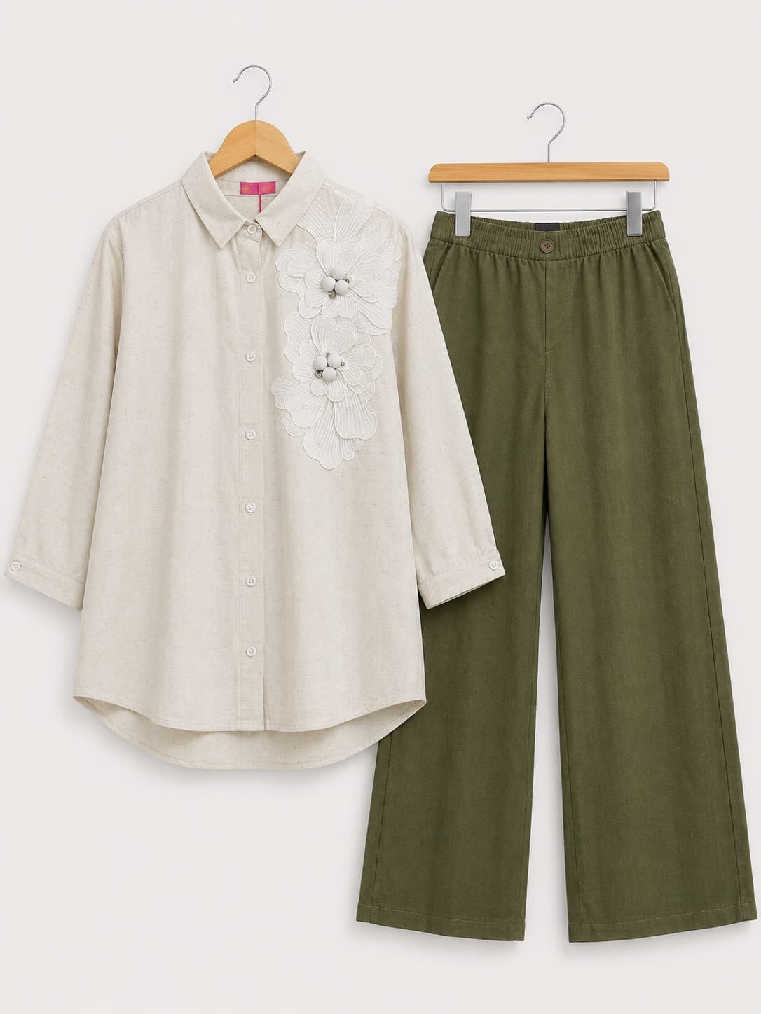 Ivory floral shirt with olive wide-leg trousers