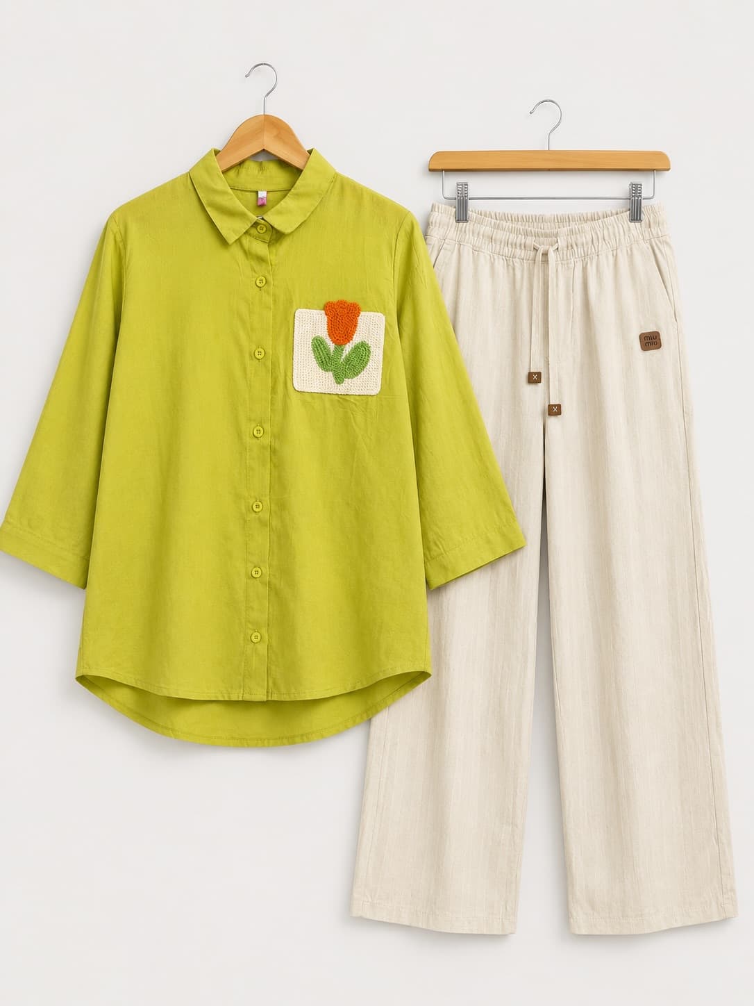 Lime shirt with tulip pocket and cream trousers
