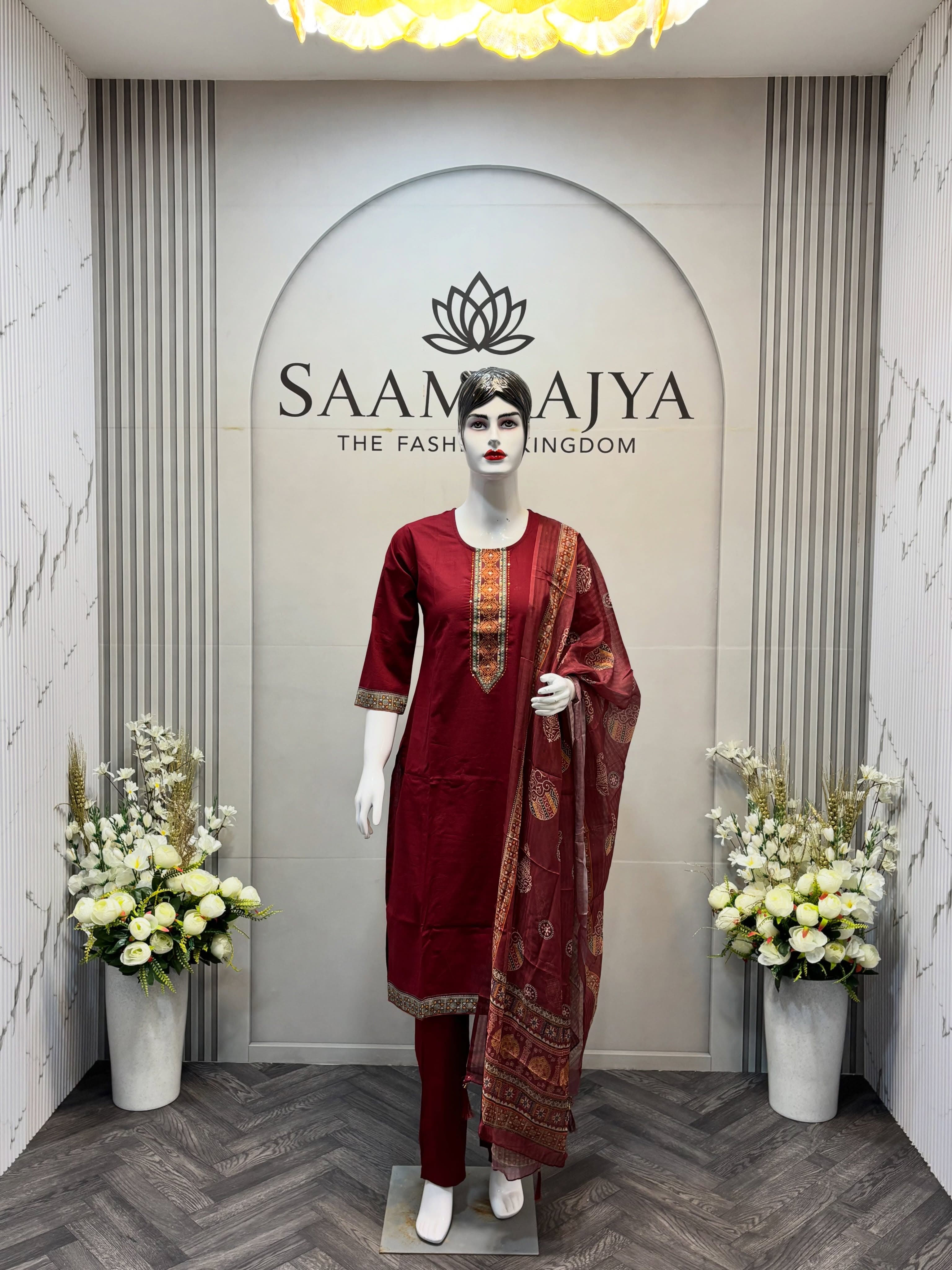 Maroon kurta on a mannequin against the Saamrajya lotus wall
